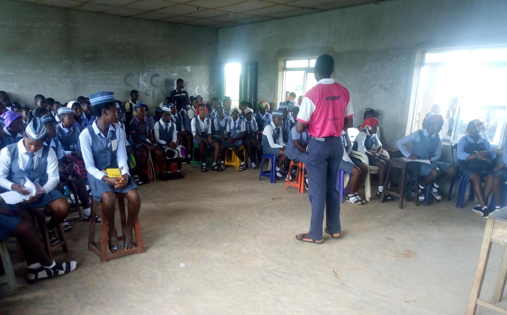Khama speaking with students during one of his motivational outreach at Christ the King College Odume.